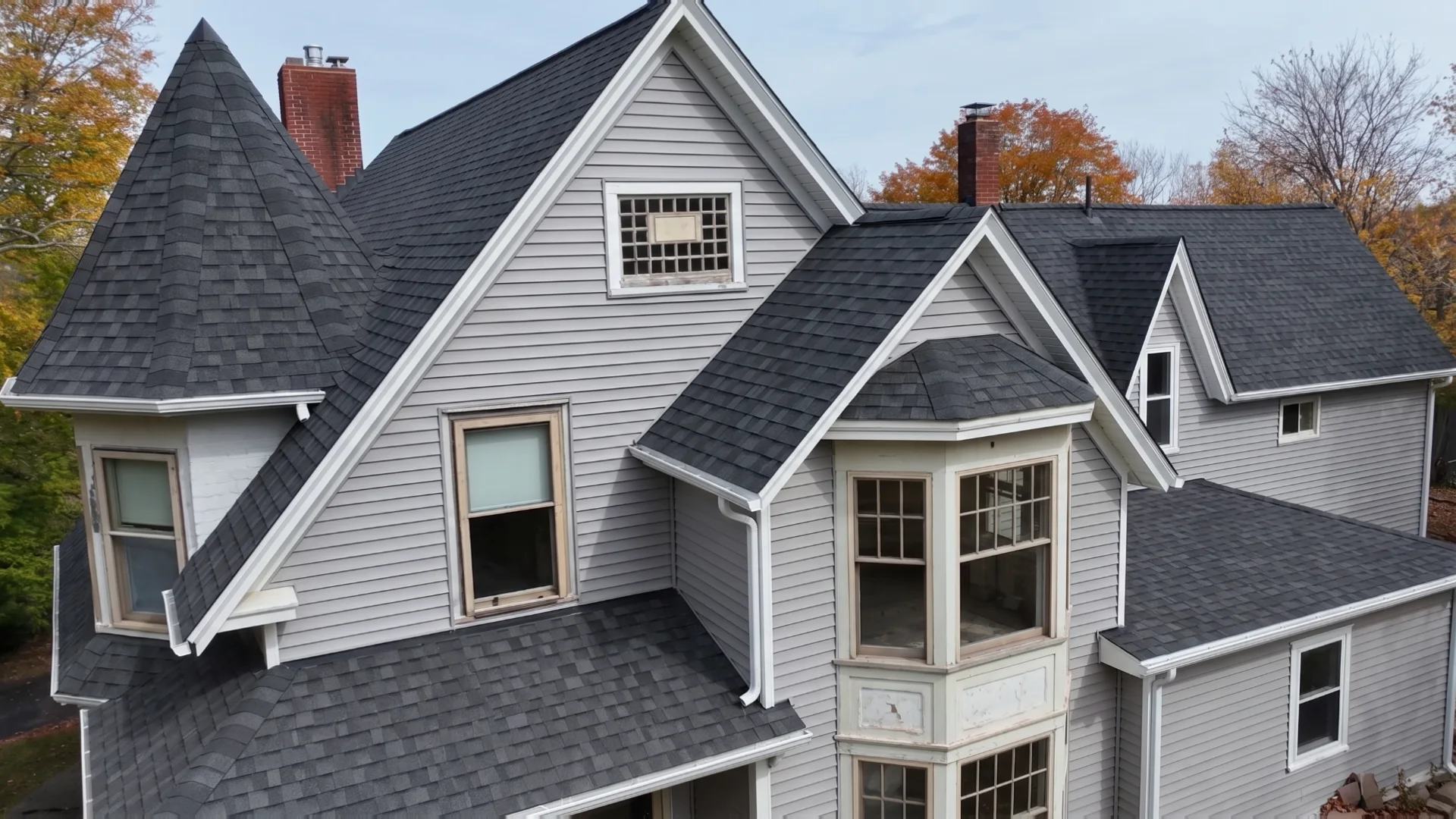 Visualization of the finished Sackville Victorian renovation: charcoal architectural shingle roof, pearl gray siding, white fascia