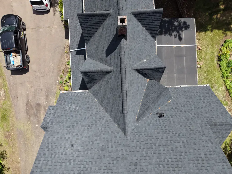 Twin black turret cones from the air after the renovation